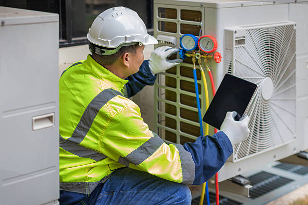 Professional Air Conditioning Repair technician working in Guthrie Center, IA